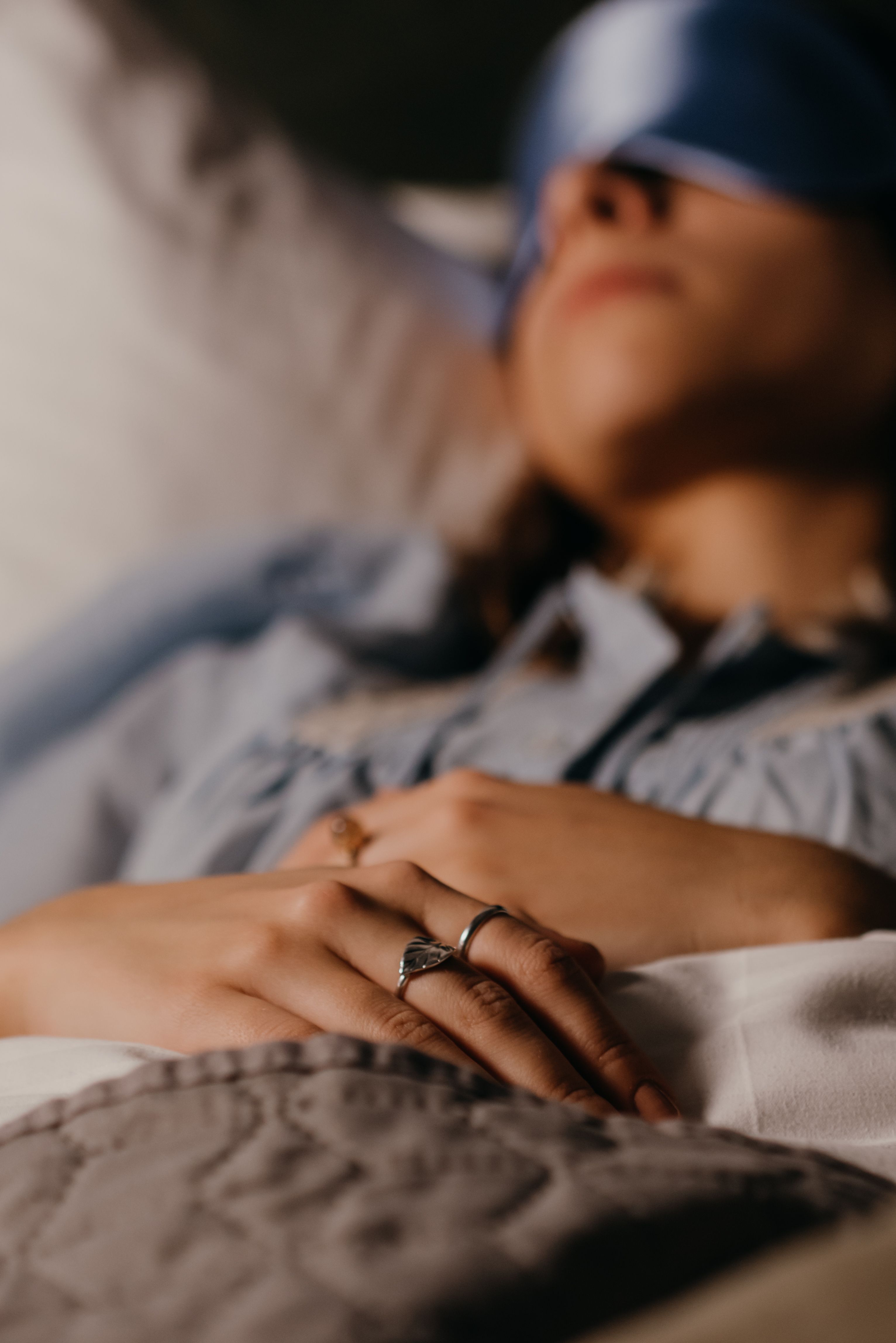 A supported psilocybin session — resting, eyeshades, safe and held